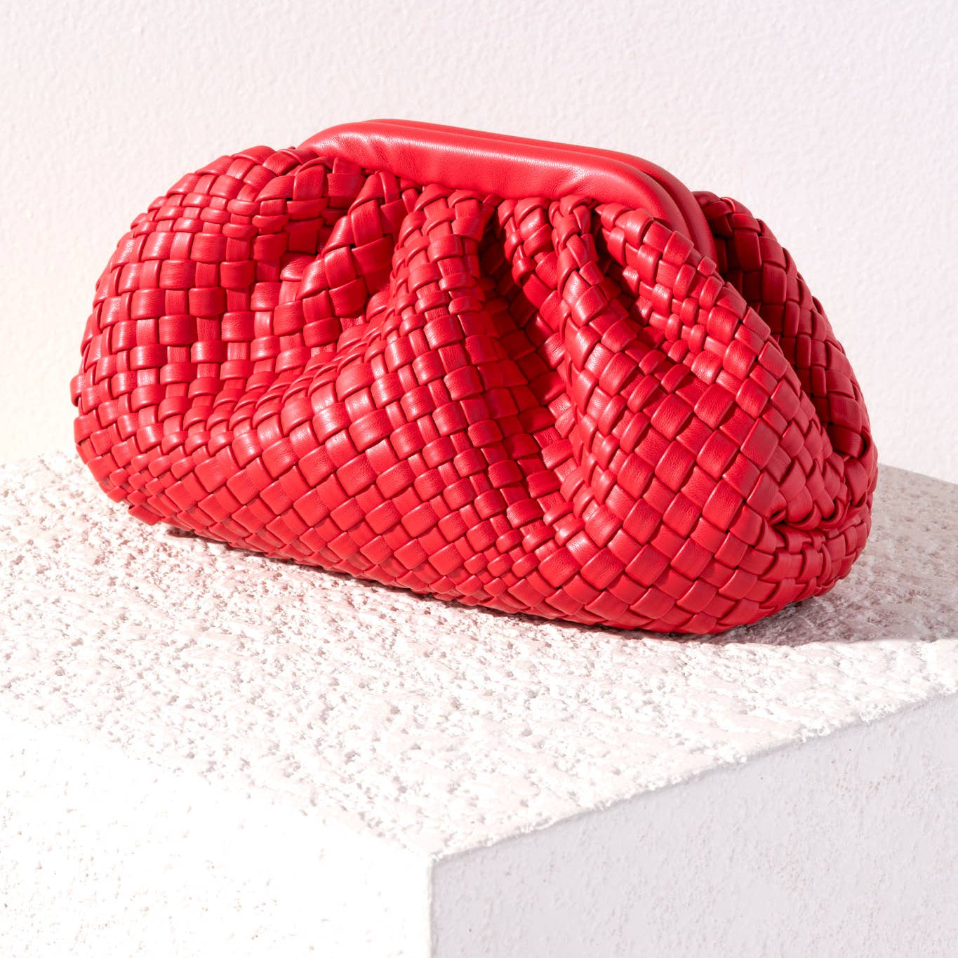 Give your handbag collection a sleek update with Shiraleah's Blythe Clutch. Made from handwoven vegan leather, this clutch is the perfect accessory for your summertime adventures.

Details:

Woven smooth PU
magnetic frame closure
1 inner zip pocket
