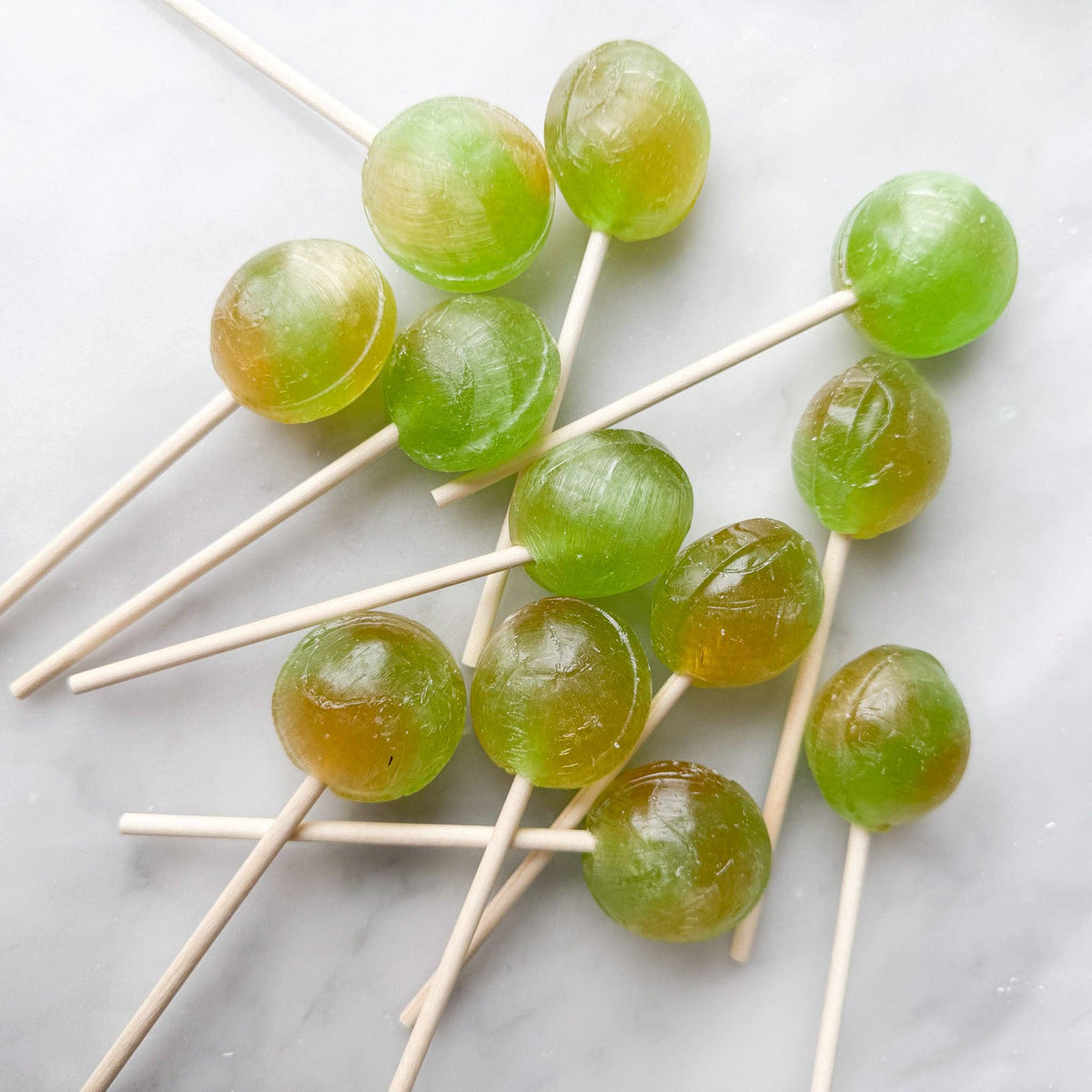 Our Caramel Apple lollipop is a delightful confection that combines the tangy taste of fresh apples with the rich sweetness of caramel. This lollipop offers a warm and inviting flavor profile that evokes the comforting essence of autumn.

Details:

Made in the USA, our candy is all American candy.
Ingredients: sugar, glucose, water less than 2% of citric acid, food coloring, artificial/natural flavoring, vegetable glycerin.