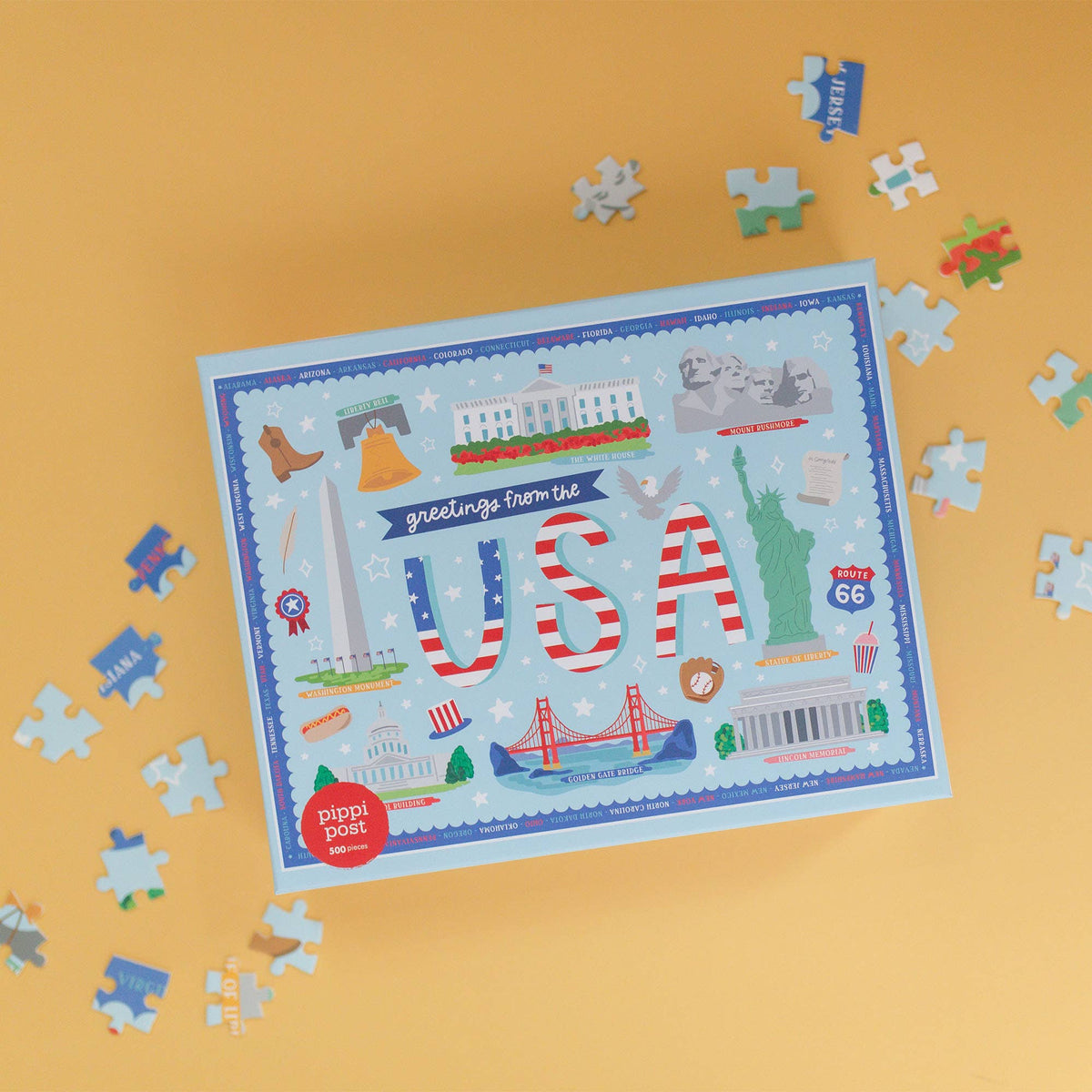 Piece together the essence of the USA with our Greetings from the USA 500 Piece Jigsaw Puzzle. Featuring hand-drawn illustrations, this puzzle is a fantastic way to celebrate the diverse and iconic landmarks across the country. Ideal for patriots, teachers, adults and kids, everyone will love piecing together American landmarks such as the White House, Mount Rushmore, Liberty Bell, the Washington Monument, the Statue of Liberty, the Golden gate Bridge, and more!&nbsp;