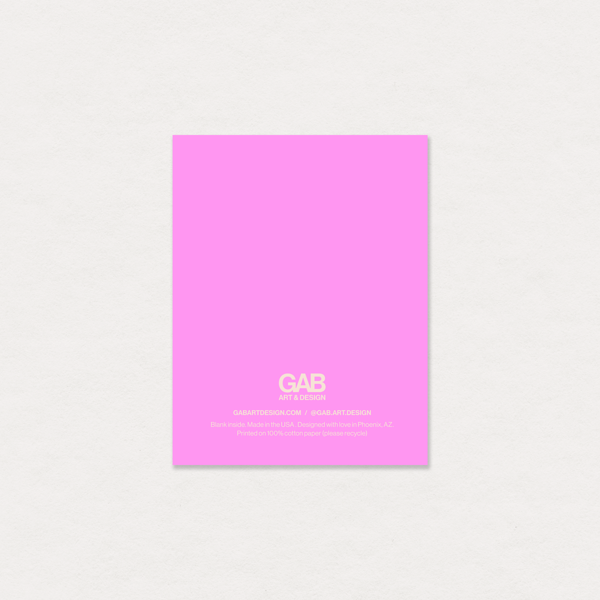 back of card with 'GAB' branding on a light gray background