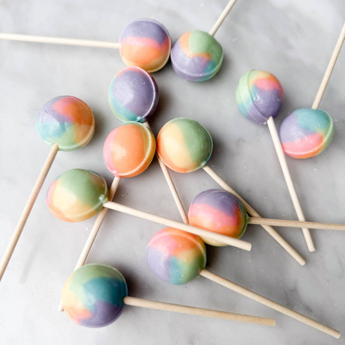 Our Rainbow Sherbet lollipop is a beautifully pastel-colored treat that captures the essence of all your favorite fresh fruity flavors. This lollipop offers a refreshing blend of deliciousness, making it a delightful choice for anyone seeking a sweet and fruity experience.

Details:

Made in the USA, our candy is all American candy— made in small batches by our talented candy makers
Ingredients: sugar, glucose, water less than 2% of citric acid, food coloring, artificial/natural flavoring, vegetable glyceri