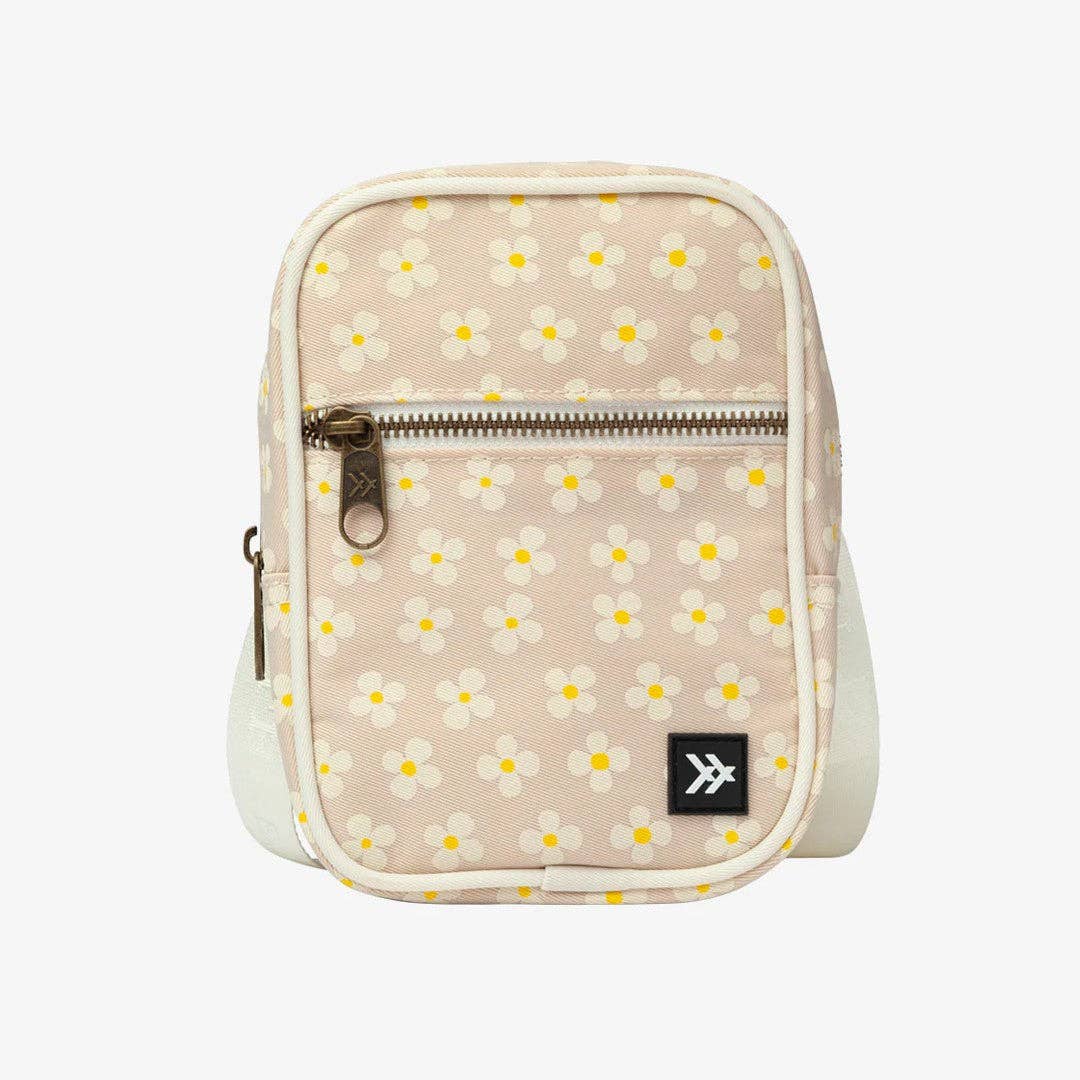 Small bag with daisy pattern on a beige background