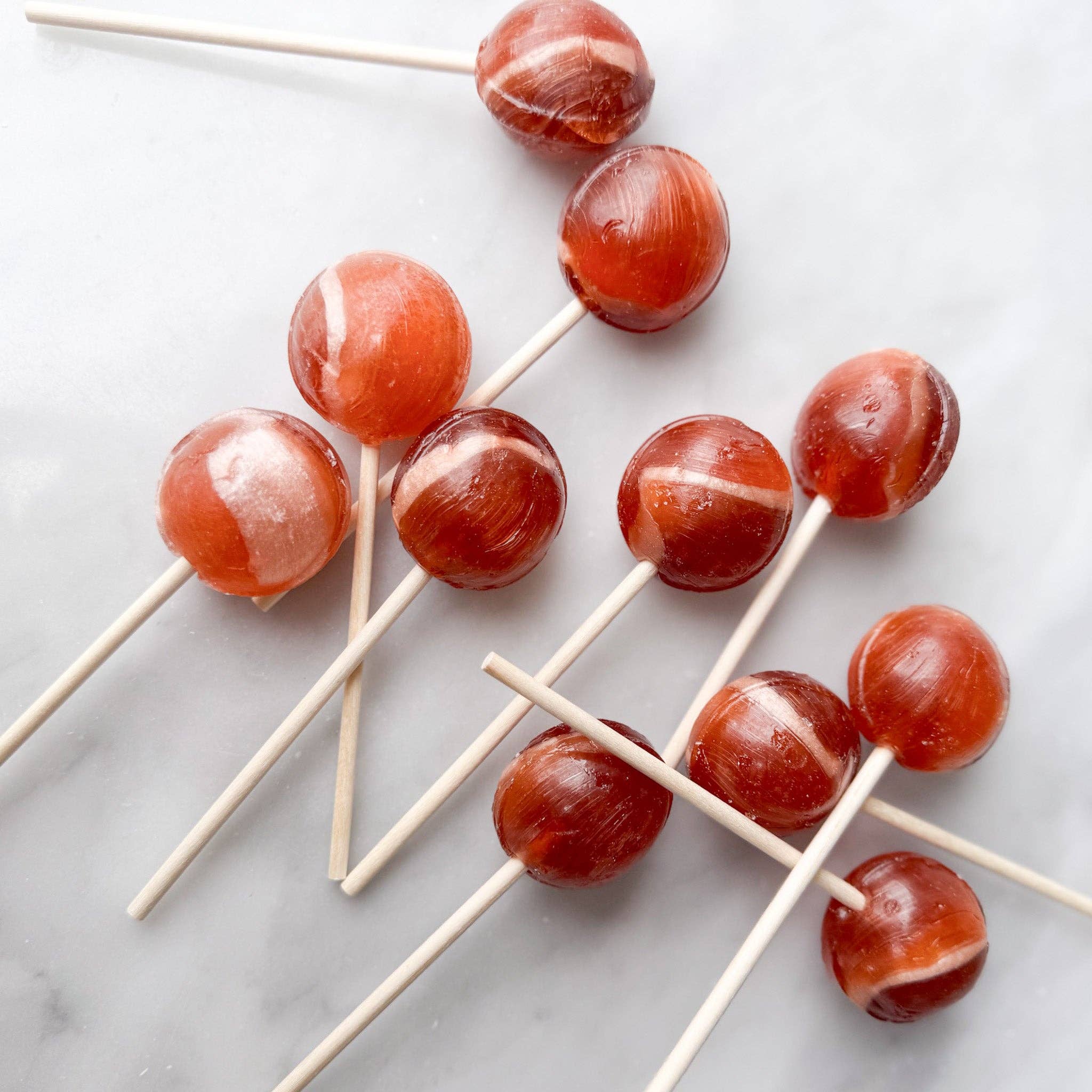Our Creamy Root Beer Float lollipop is a unique confection that captures the classic flavors of a root beer float. This lollipop combines the essence of traditional root beer with a rich and creamy finish, evoking the nostalgic experience of enjoying a cold float on a warm day.

Details:

Made in the USA, our candy is all American candy-- made in small batches by our talented candy makers.
Ingredients: sugar, glucose, water less than 2% of citric acid, food coloring, artificial/natural flavoring, vegetable 