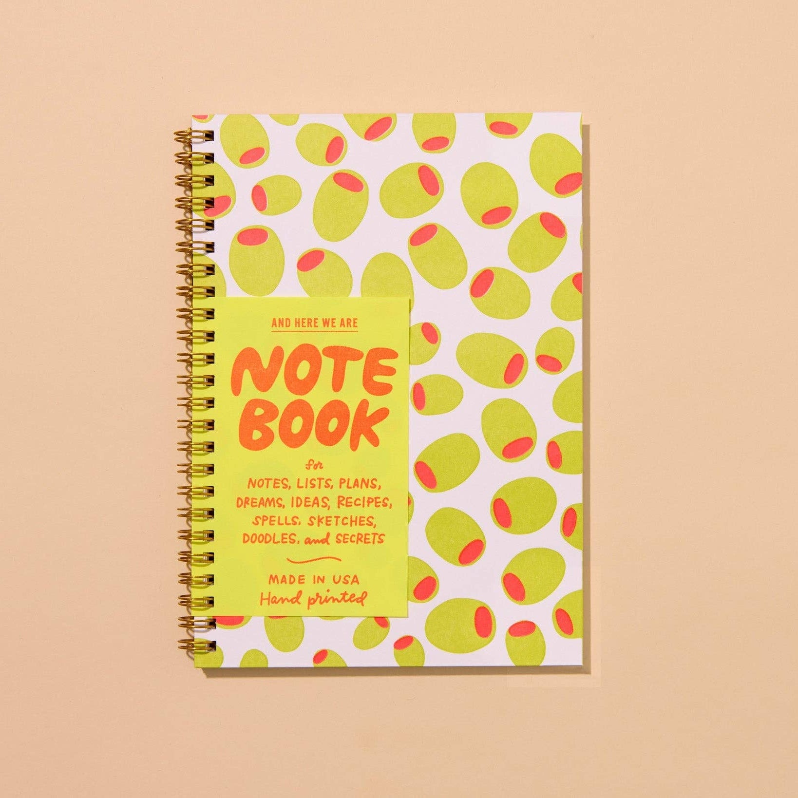 Our best-selling olive notebook features modern, colorful martini olives scattered in vibrant inks.

And Here We Are® creates modern, colorful, hand-printed greeting cards, notebooks, stationery, and gifts from our letterpress studio in Columbus, Ohio.