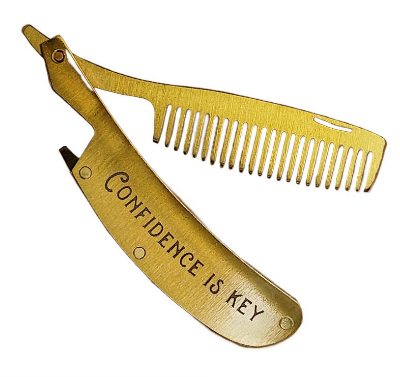 Gold straight razor and comb set with 'Confidence is Key' engraving on a white background
