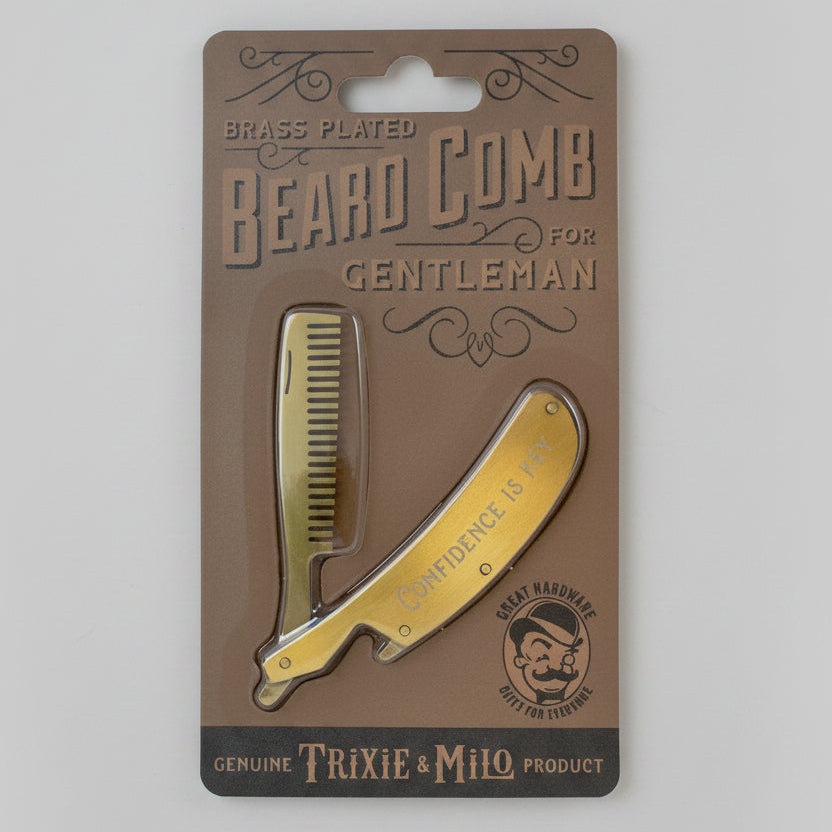 Beard comb for gentlemen on a branded packaging with decorative text.