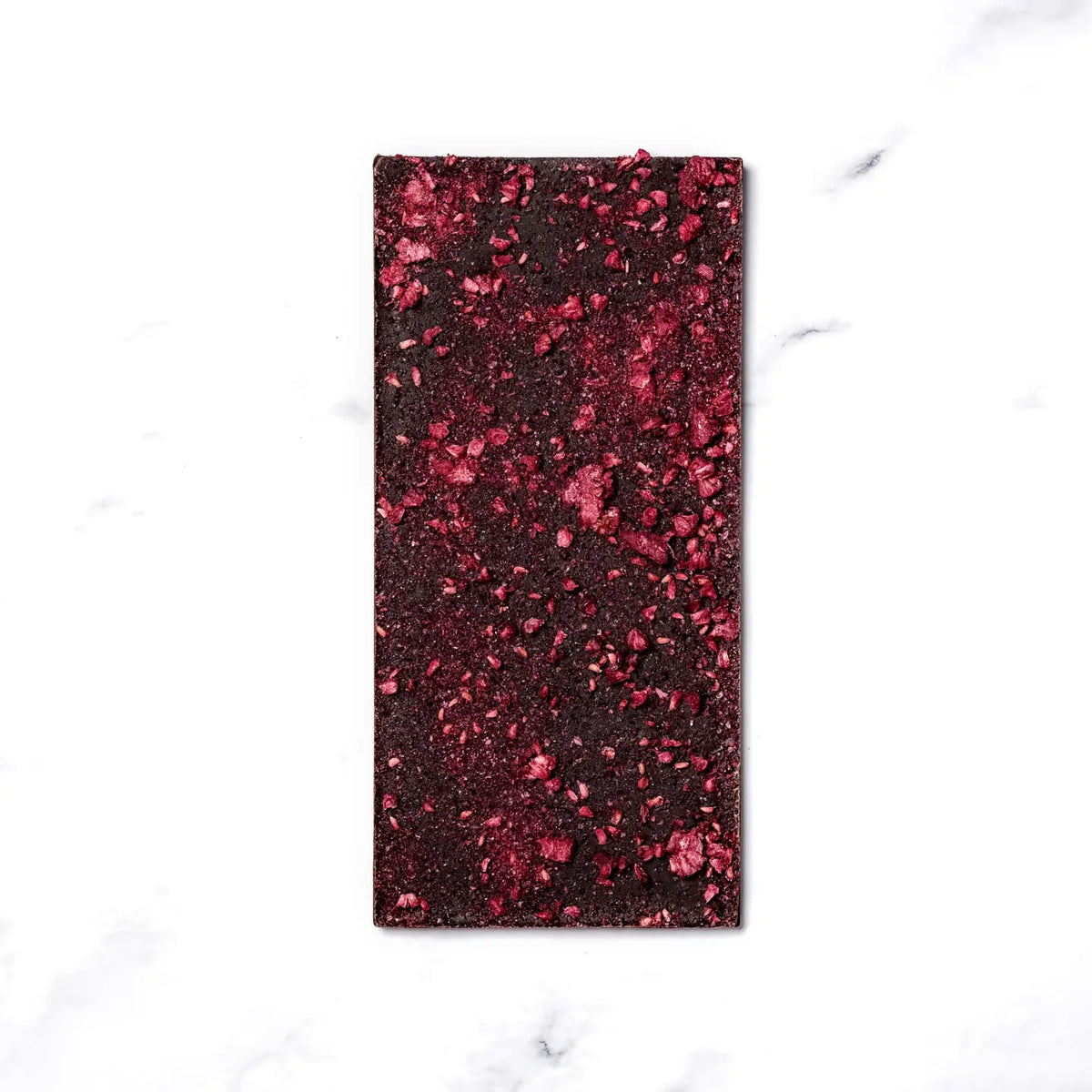 This bar is the perfect celebratory treat—the tasting notes of sparkling white wine infused cacao complement the sweet tartness of the raspberries. Whether you’re celebrating the end of a day on the ski hill, toasting a birthday, or cheering at midnight on New Year’s Eve, this bar is sure to bring you cheer & chocolate. This bar is best paired with a long day in the mountains.