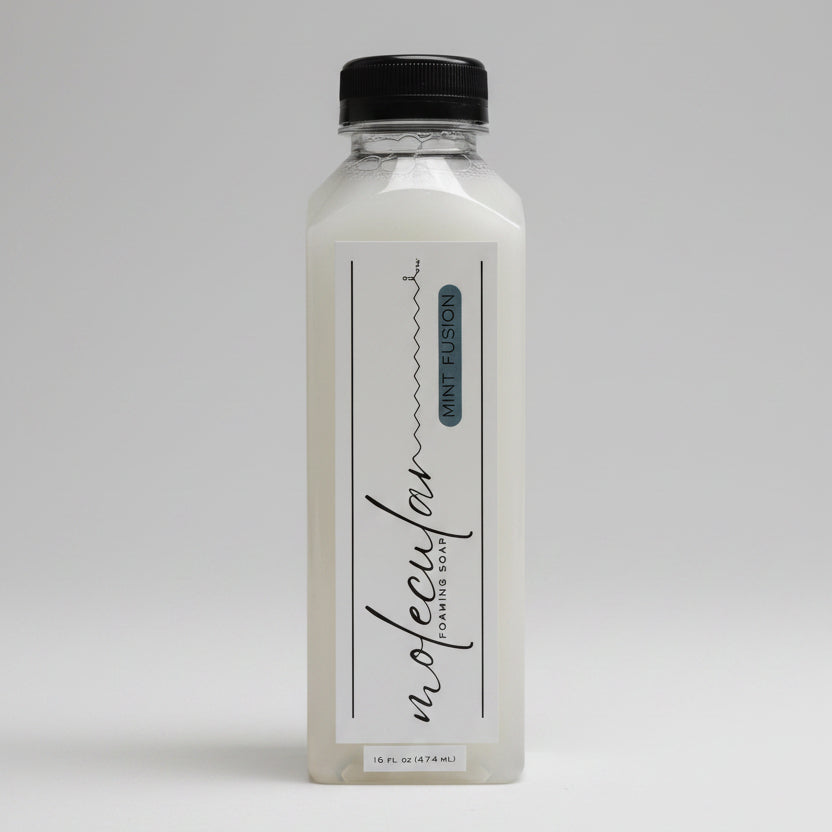 Tall rectangle plastic bottle with black lid and white minimalistic label. 