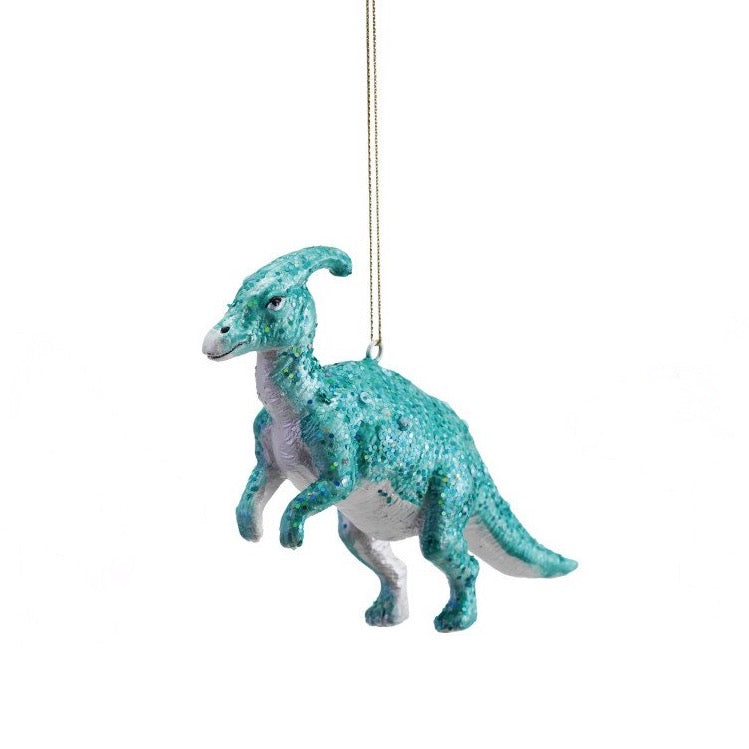 Teal dinosaur ornament hanging on a white background