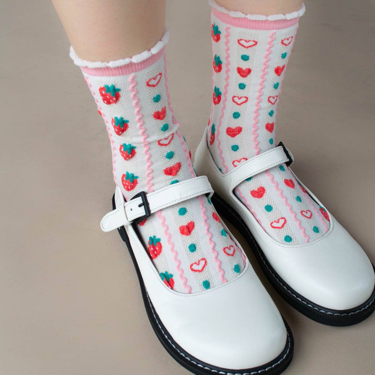 ntroducing our Retro Strawberry Casual Socks, featuring a vintage look that adds a touch of nostalgia to any outfit. Not only are these socks cute and stylish, they also provide unparalleled comfort for your feet. Upgrade your sock game with these must-have socks.

Adult Size
80% Cotton ,10% Spandex, 10% Polyester
