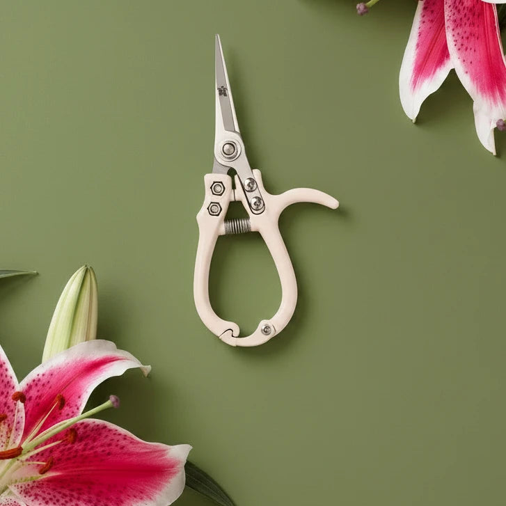 The best way to prune your plants is in style, of course. With an ergonomic handle and a support pillar for extra control, these garden snips are perfect for light pruning, snipping and deadheading. Created by Jungle Club these pruning shears are not only adorable, but also a planting tool you can't live without.

• Dimensions | 6.5” x 3”
• Shear Length | 2.4”
• Cutting Capacity | 6mm
• Materials | High Carbon SK-5 Steel, Hard Chrome Plated, Aluminum Handle
• Imported