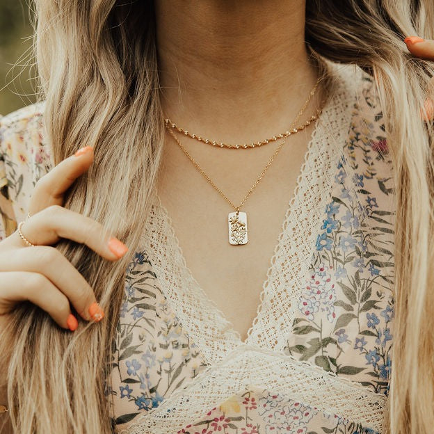 The Amelia Gold Filled Twist Necklace is the perfect piece to stack with other&nbsp;necklaces or wear as a stand alone accessory. She’s 18k gold filled, tarnish and wear resistant, and made to last. Hypoallergenic and nickel free, this unique and dainty 3mm chain is the perfect accessory all year long.&nbsp;16" length.