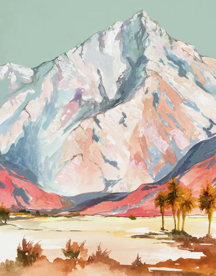 white and light blue mountains rises front and center, blushing from the bright pink hills in the foreground. Palm trees done in mustard create shadows. 
