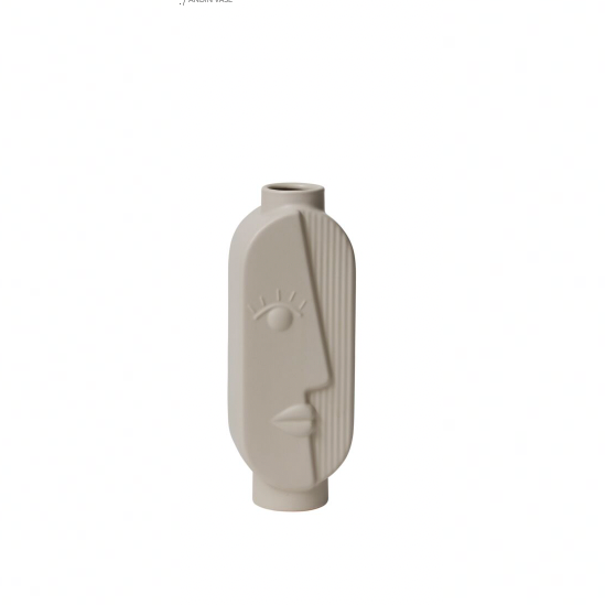 Decorative vase with face design on a white background