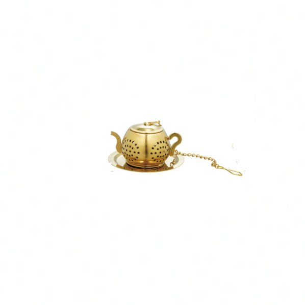 Gold teapot-shaped tea infuser on a white background