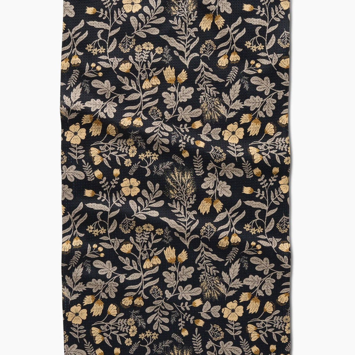 black tea towel with yellow/green floral pattern