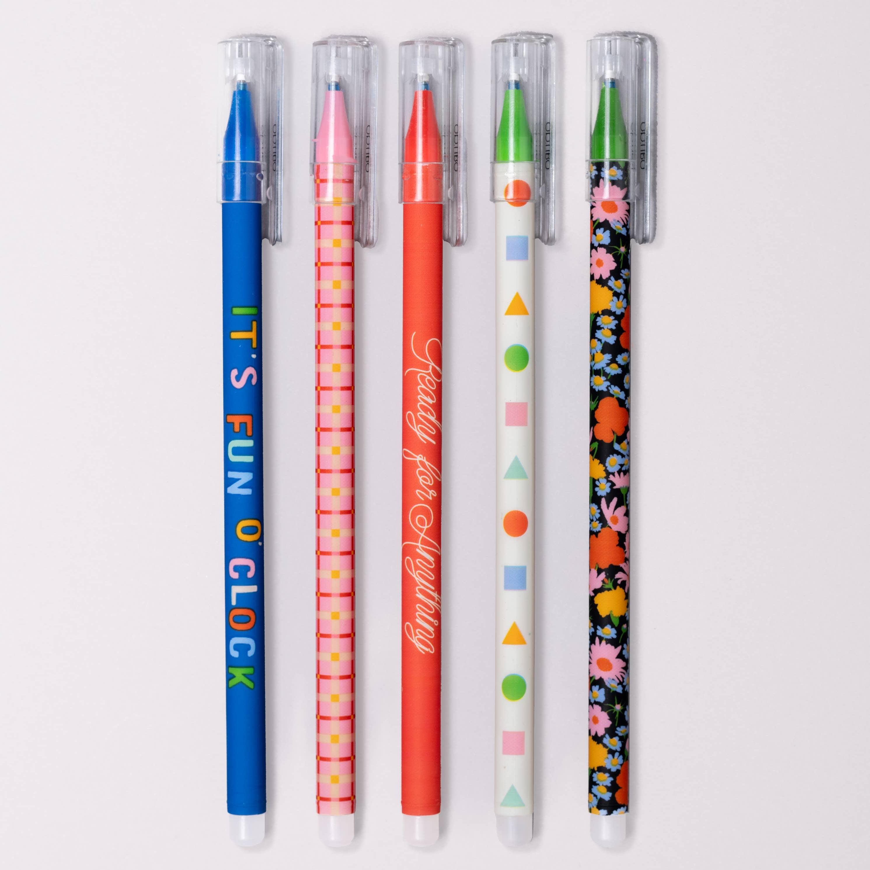 Five colorful pens with unique designs in clear packaging on a white background