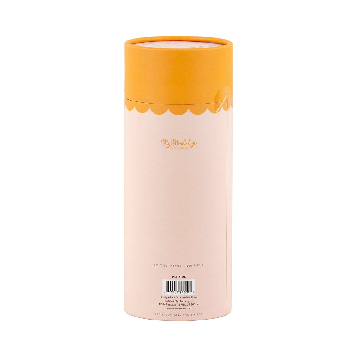 A tall, cylindrical product box in pale blush pink with a bright orange lid and a scalloped orange band near the top. The front has the brand name 'My Melody' printed in gold script, along with a barcode and small text at the bottom.