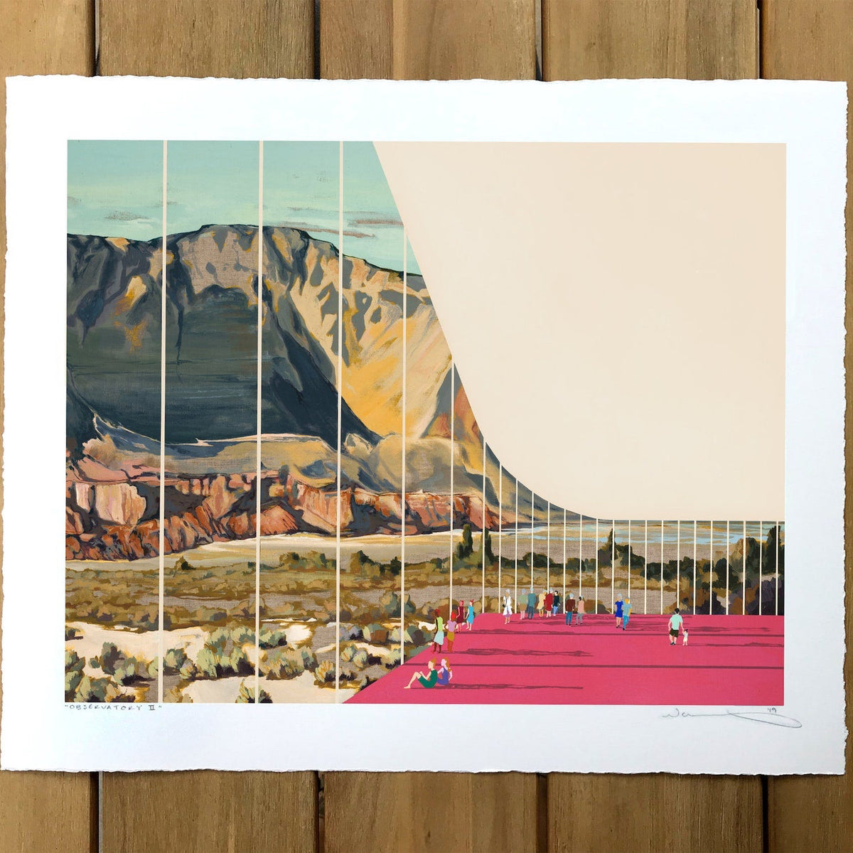 print shown against a wooden table. 