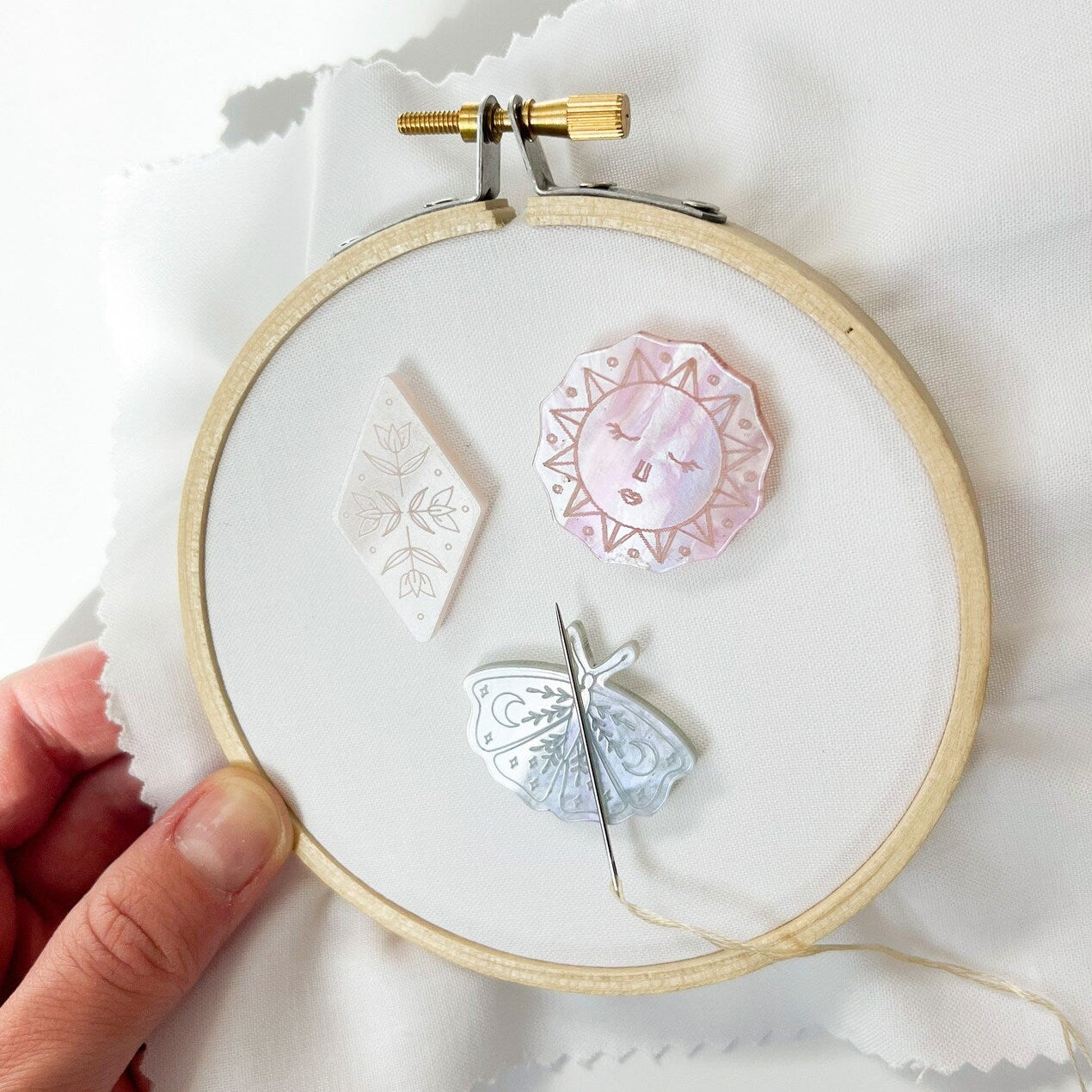 Needle Minders