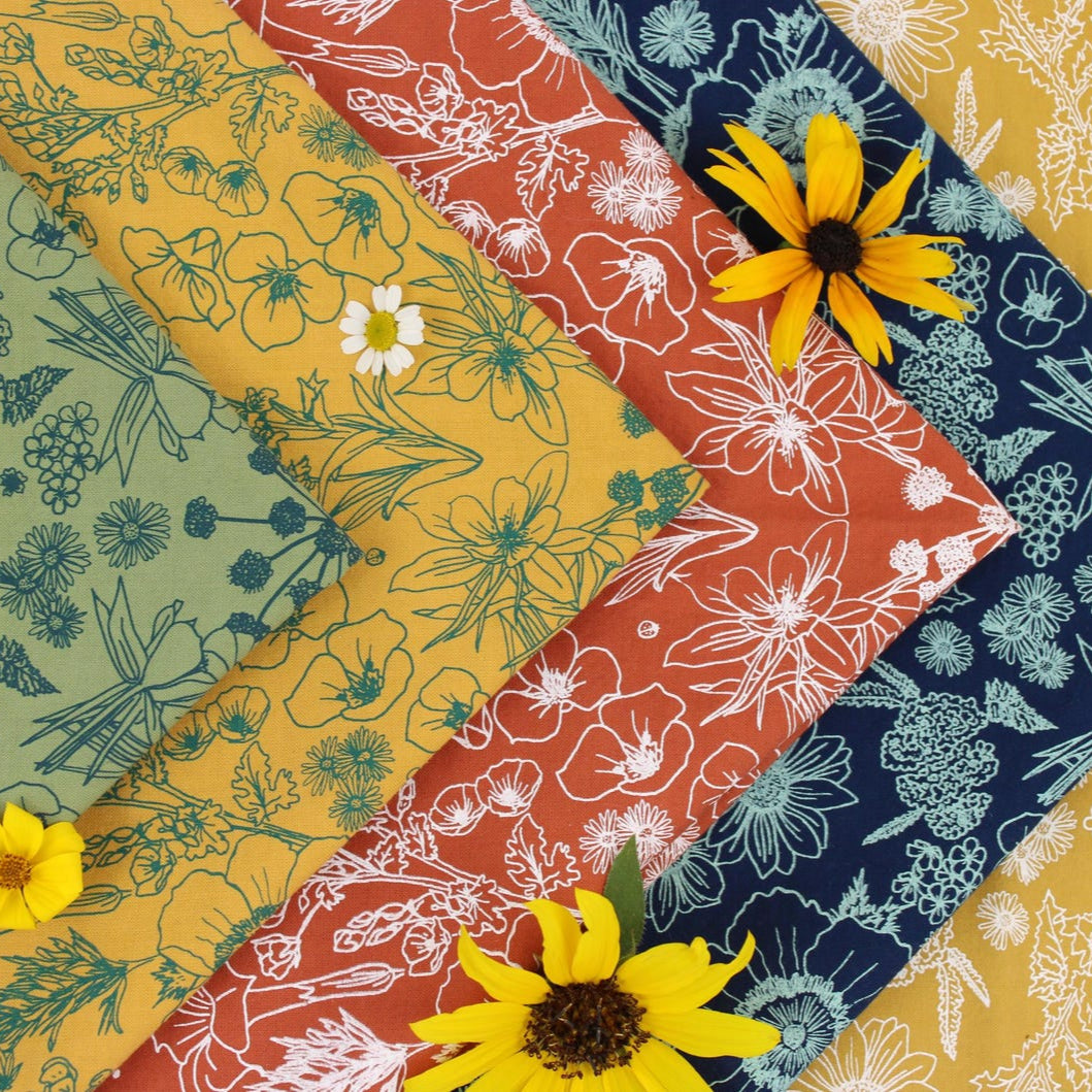 Collection of floral fabric swatches in various colors and patterns.