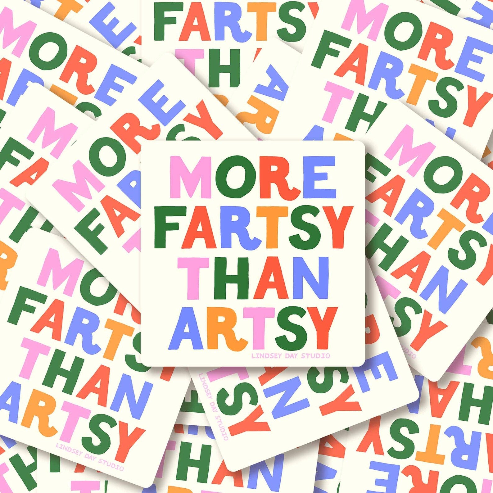 White square sticker with colorful words "more fartsy than artsy".