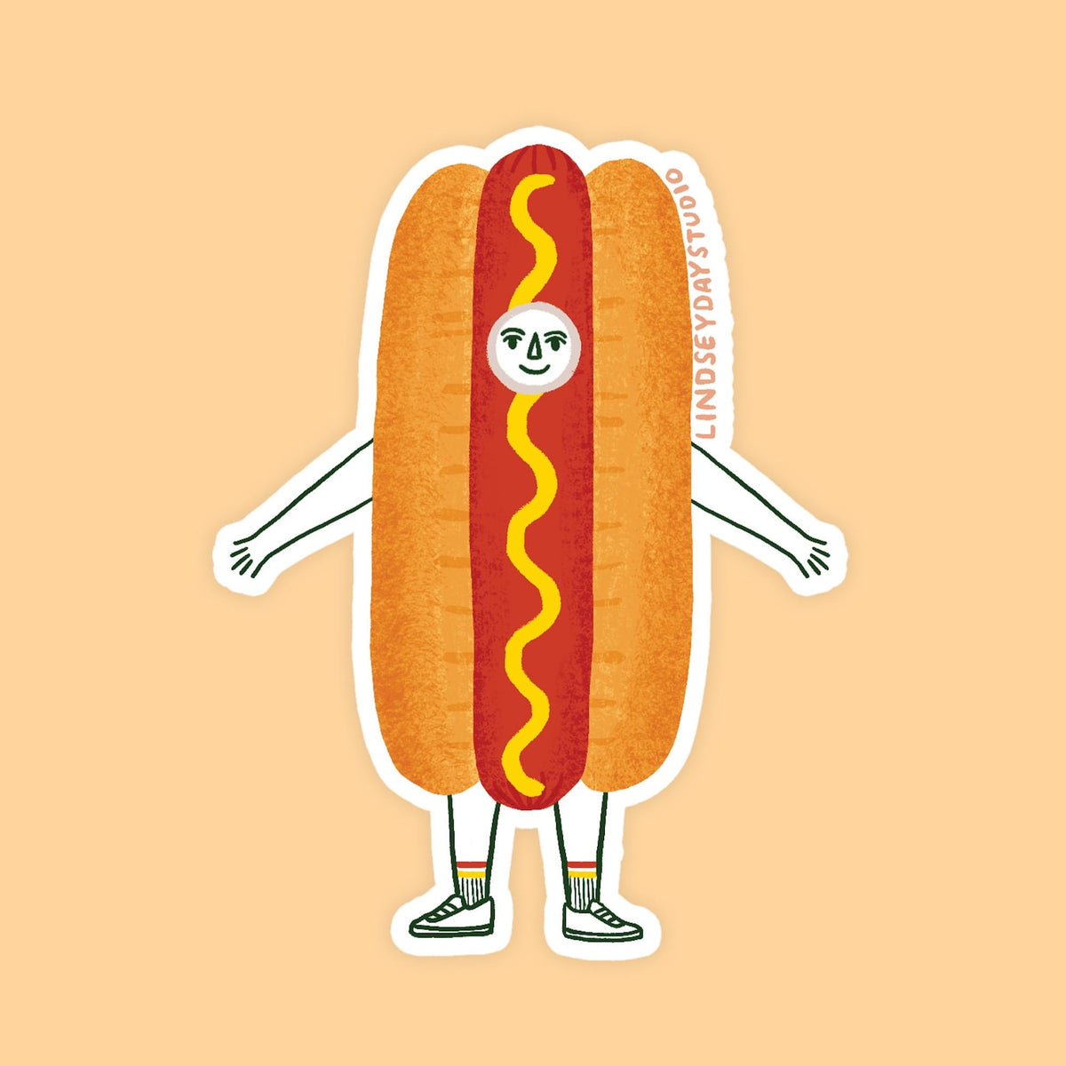 A hot dog with mustard, a face, arms and legs. 