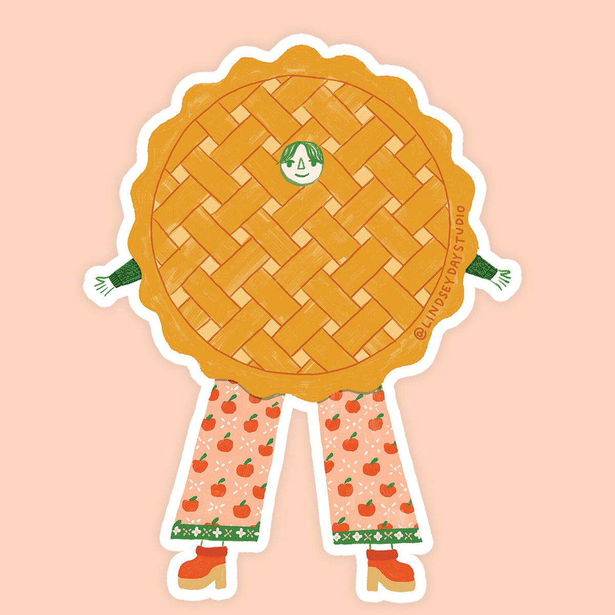 Lattice apple pie with a face, arms and legs. 