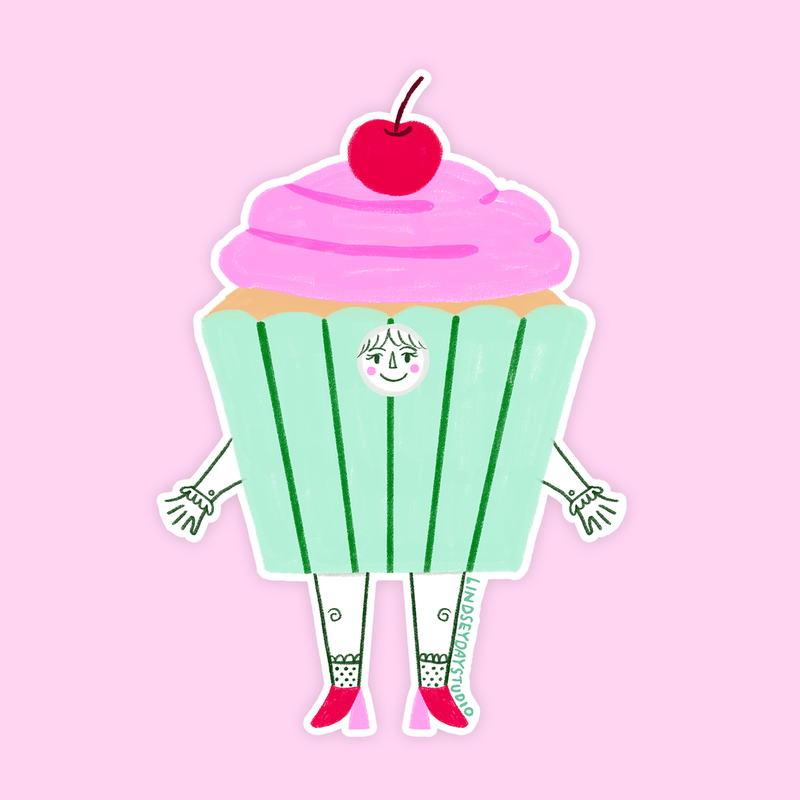 Pink frosted with a green wrapper and cherry on top. Has a face with arms and legs. 